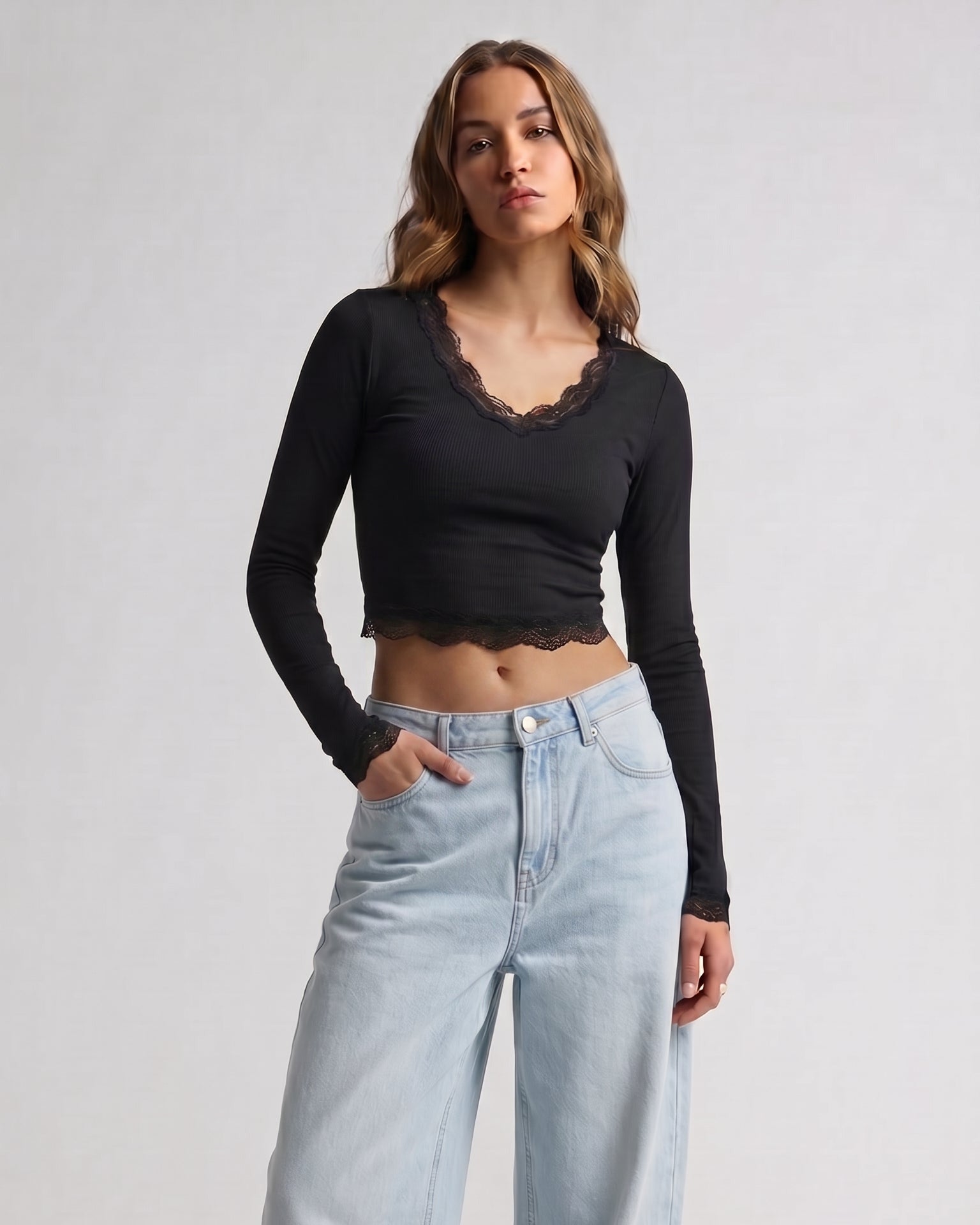 AURRA Cropped V Lace Top in Black with light denim