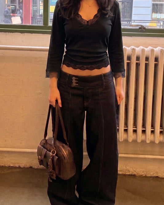 AURRA Cropped V Lace Top in black, worn with dark wide-leg trousers
